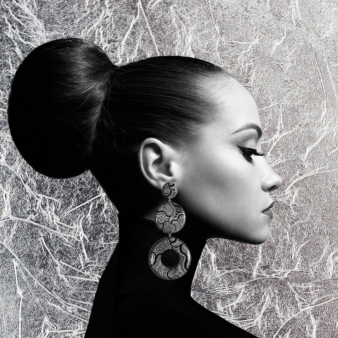 ATHENA TRIPLE OPEN DISC STATEMENT EARRINGS - ST052